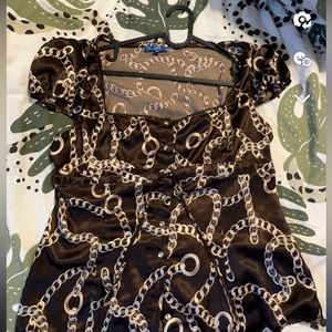 Fun silk feeling vintage top! Probably early 2000s , but retro and fun.